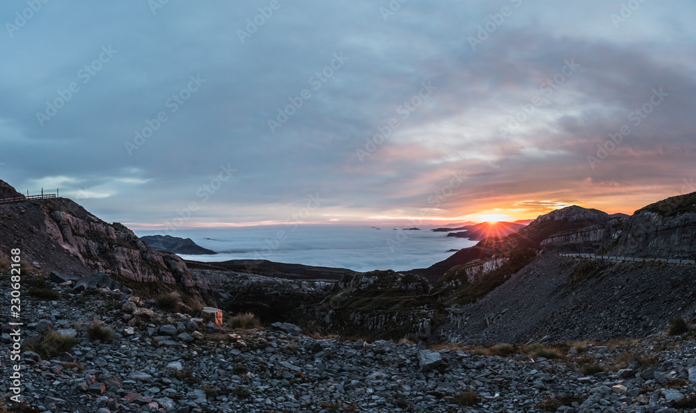 landscape of mountains at sunrise above the clouds, sea of clouds landscape of mountains at sunrise above the clouds, sea of clouds
