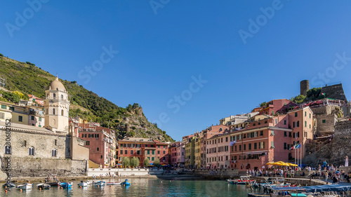 The historic center of Vernazza on a sunny day and blue sky, Cinque Terre, Italy