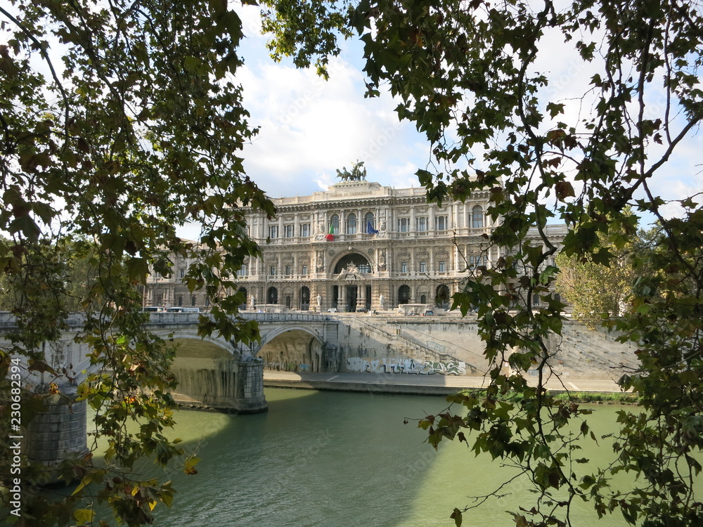 beautiful bulding and a bridge on bank of river in Rome