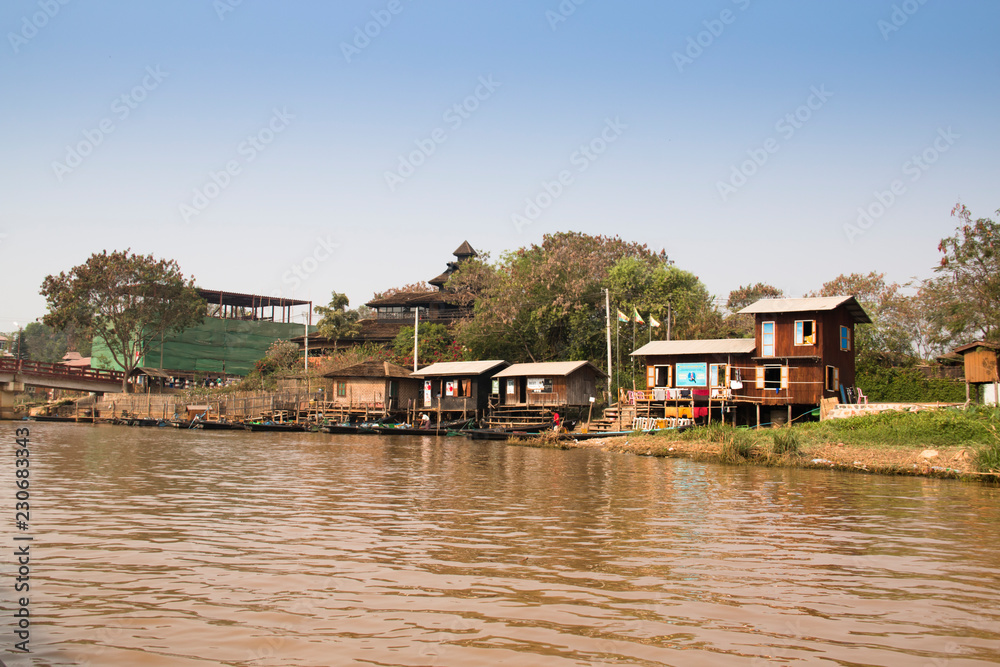 Houses at the shore of Inle Lake, one of the top tourist attractions of Myanmar

