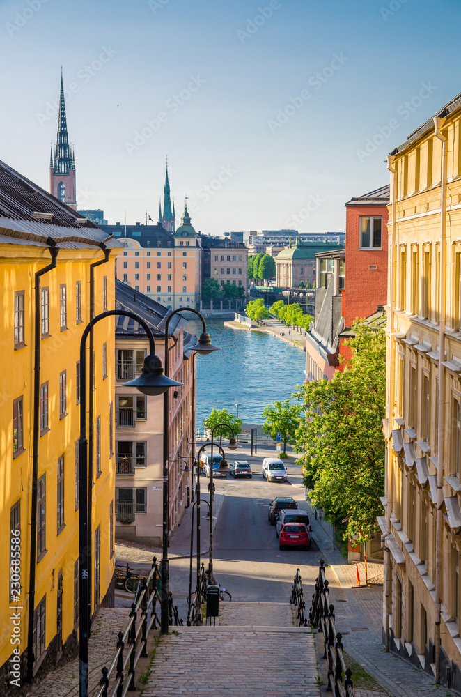 Narrow street staircase down to Lake Malaren, Stockholm, Sweden - obrazy, fototapety, plakaty 