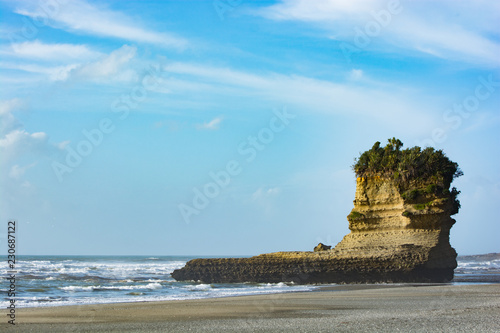 A small island on the beach of Punakaiki, West Coast, New Zealand photo
