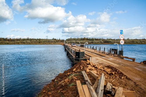 Fototapeta Naklejka Na Ścianę i Meble -  Crossing the river. Russian North.