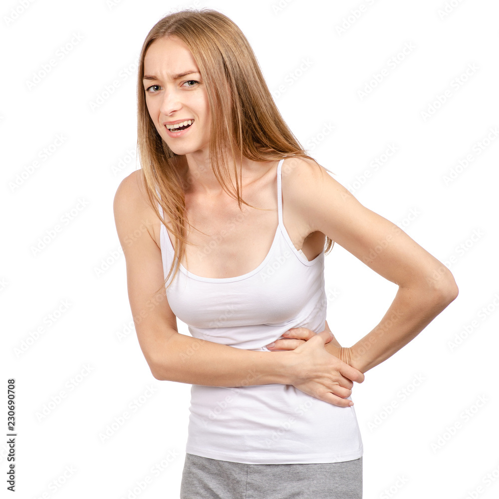 Beautiful young woman stomach pain on a white background. Isolation Beautiful young woman stomach pain on a white background. Isolation