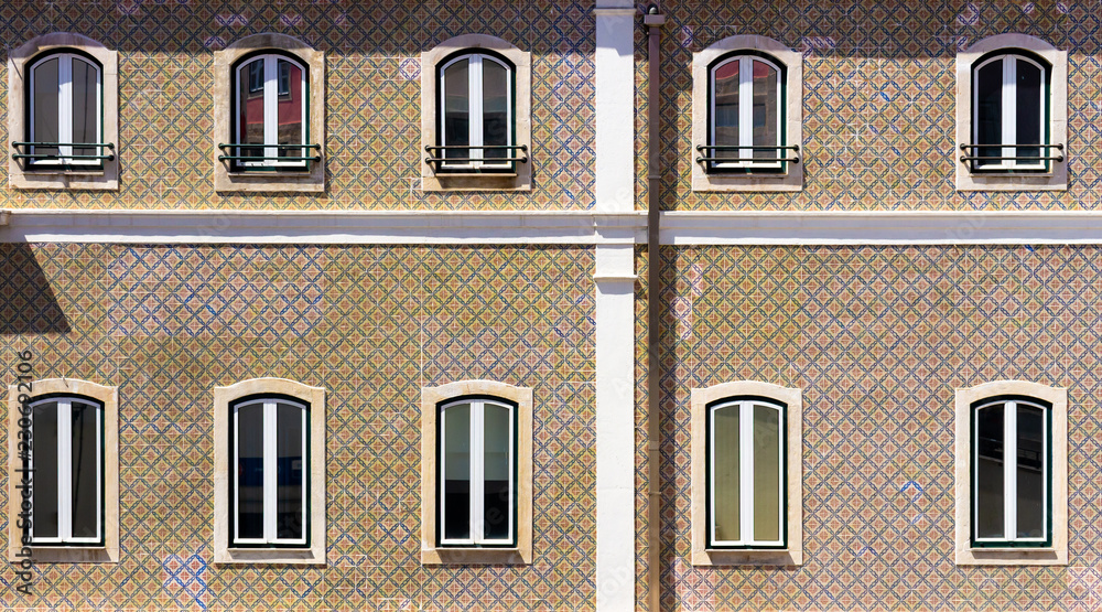 Several windows of a typical house in Portugal.