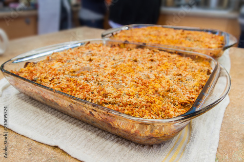 Two Large Glass Casserole Dishes of Baked Pasta and Cheese Gratin Casserole