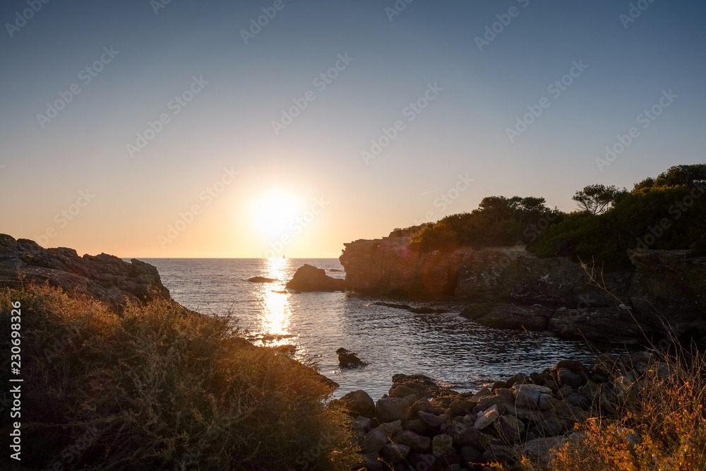Sunset on rhe rocks in six-fours france