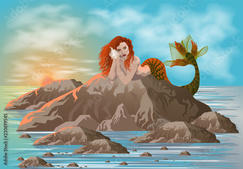 mythical creature: mermaid lying on reefs languishing waiting