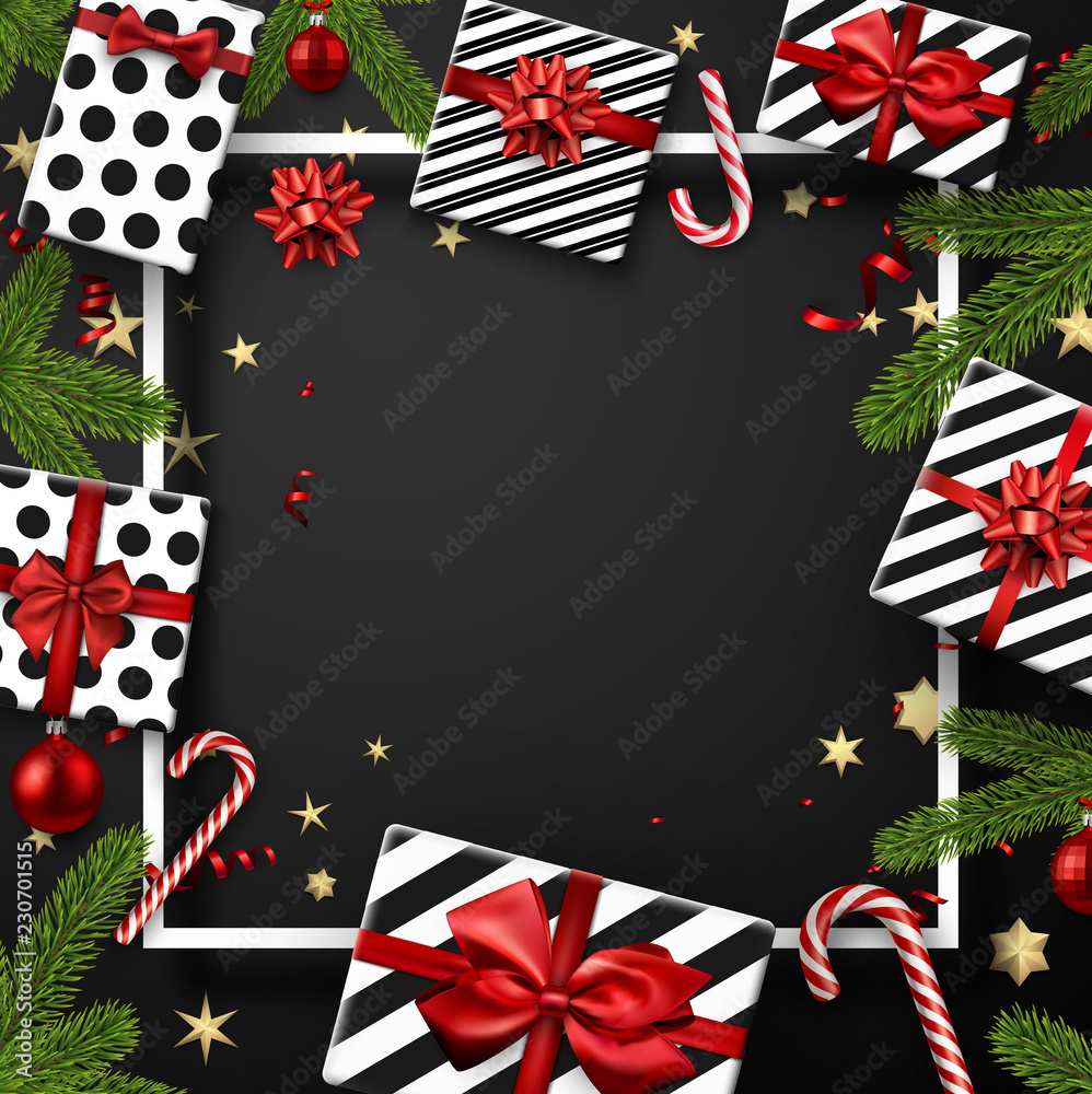 Obraz premium Christmas and New Year card with fir branches, gifts, candy and confetti. Top view card.