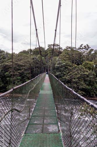 Fototapeta Naklejka Na Ścianę i Meble -  Sarapiqui adventure suspension Bridge Canopy Tours in the rain forest, Costa Rica