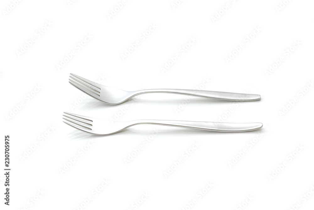 Two forks agains a white background Two forks agains a white background