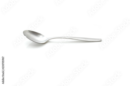 Single spoon agains a white background