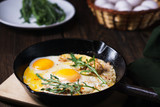 Keto diet concept, low carb food, eggs with bacon and arugula, nourishing meals rich with proteins