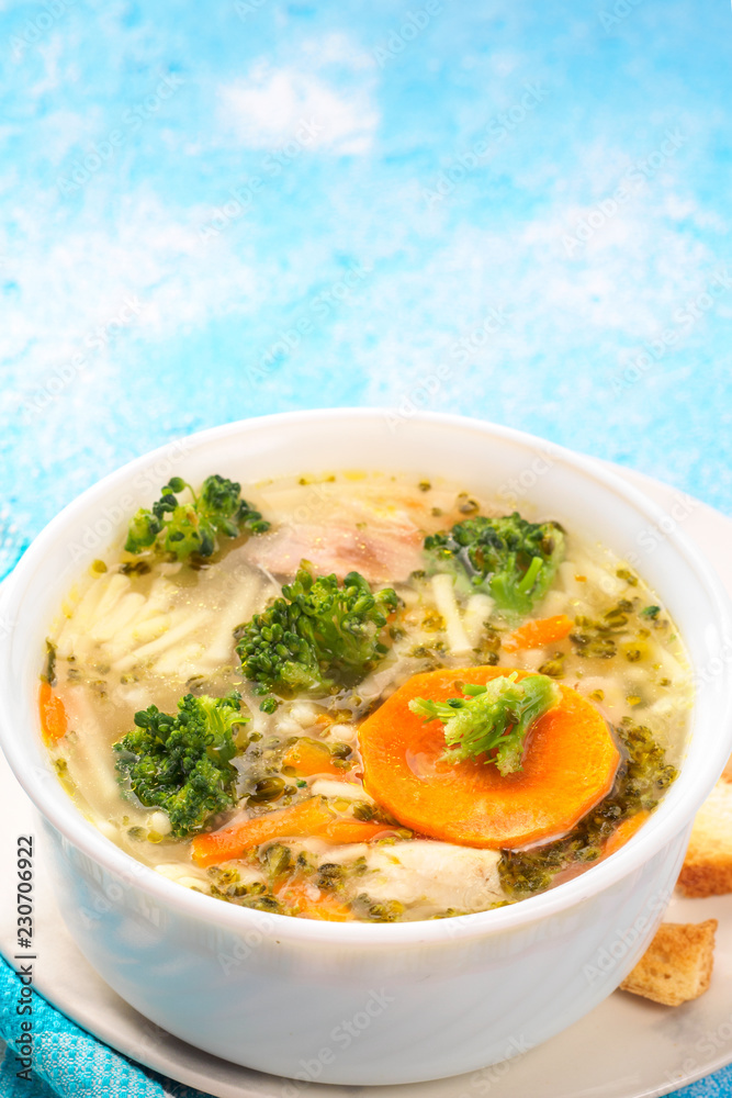 Italian vegetable soup with broccoli carrots and noodles in chicken broth Italian vegetable soup with broccoli carrots and noodles in chicken broth