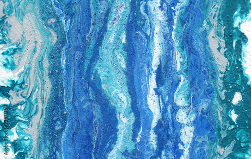 Water. Fluid Art. Abstract colorful background, wallpaper, texture. Mixing paints. Modern art. Marble texture