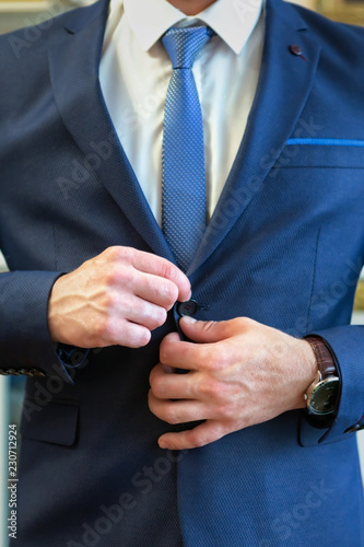 wedding men's hands button up. place for text