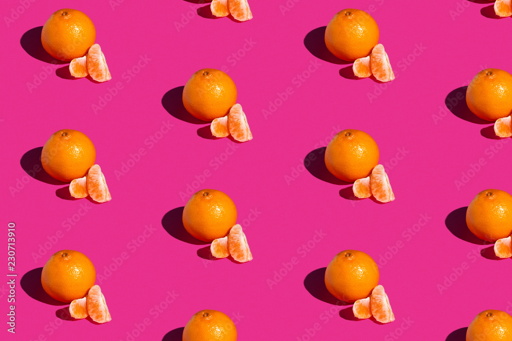 composition of orange on a pink background