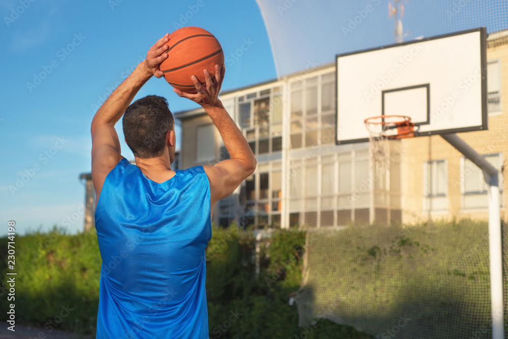 Fototapeta premium Basketball player in free throw.