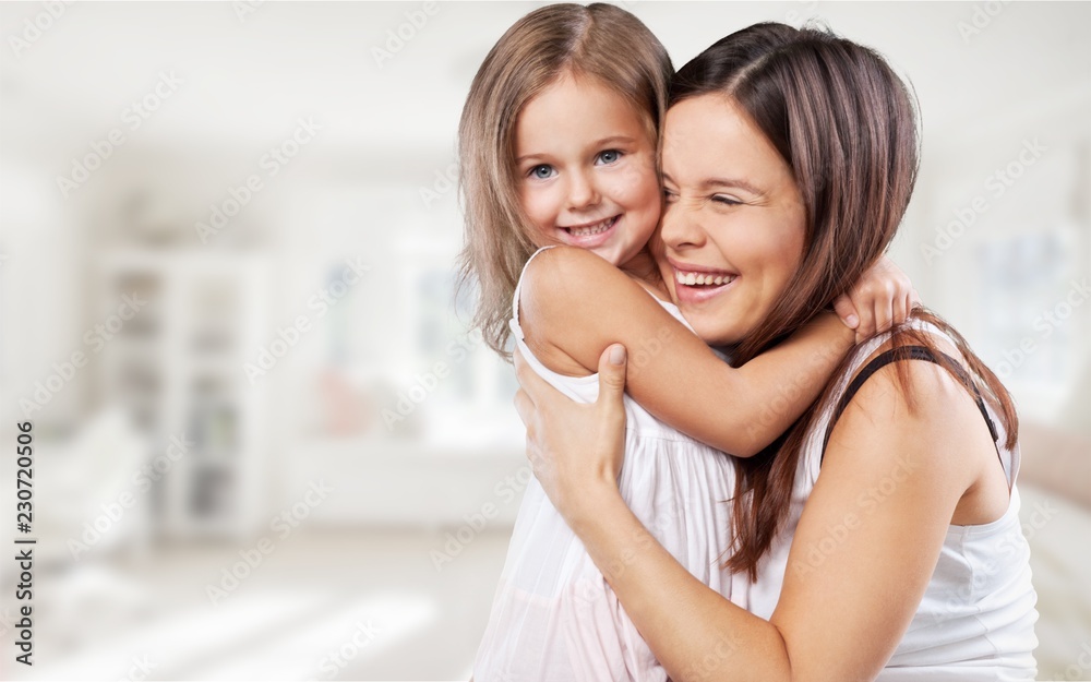 Happy Mother and daughter hugging Happy Mother and daughter hugging