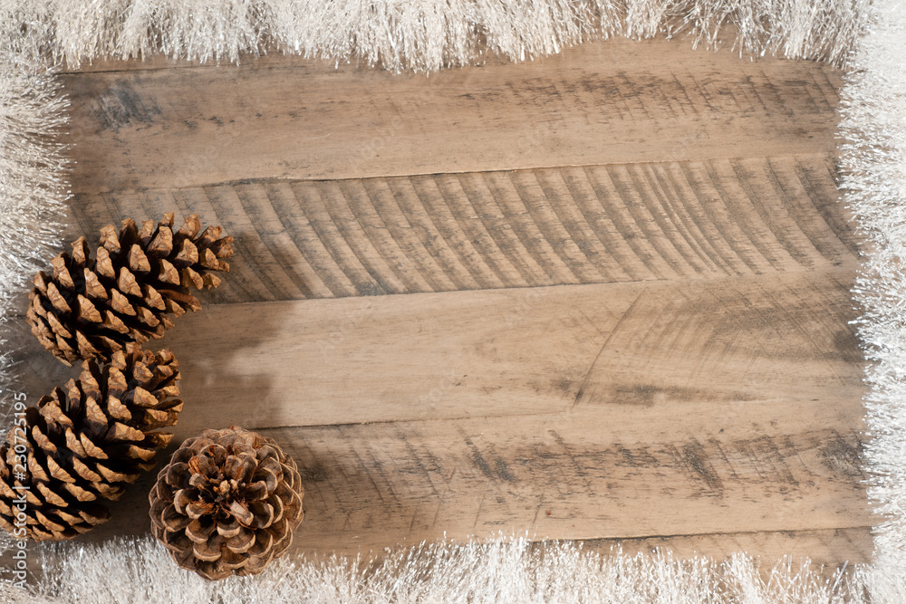 Obraz premium christmas background with snow and holy tree branchon wooden background