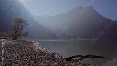 sunny morning at lake Vilsalpsee in the Allg√§u Alps photo