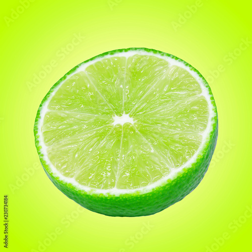 Half of Lime Citrus Fruit isolated on GREEN background