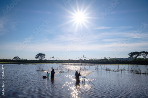 Fisherman under the sun