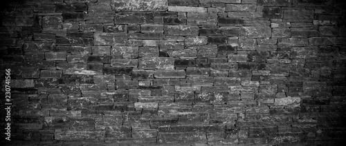 Black stone wall texture and background