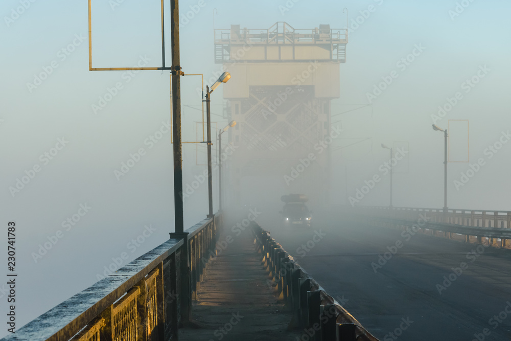 Foggy morning on a bridge in Kremenchug, Ukraine