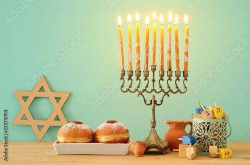 image of jewish holiday Hanukkah background with menorah (traditional candelabra).
