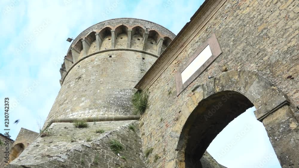 Gate of ancient Fortezza Medicea, medieval fortress in Volterra ...