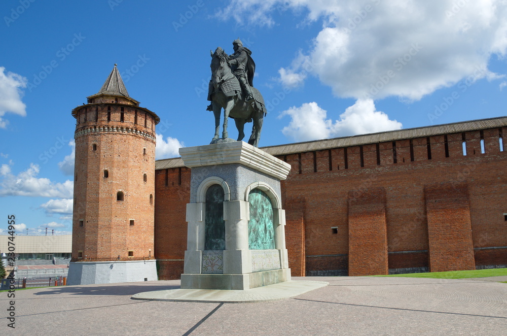 Kolomna, Russia - August 17, 2018: View on Marinkina Tower of Kremlin with Monument to Dmitry Donskoy on blue sky background In Sunny day 