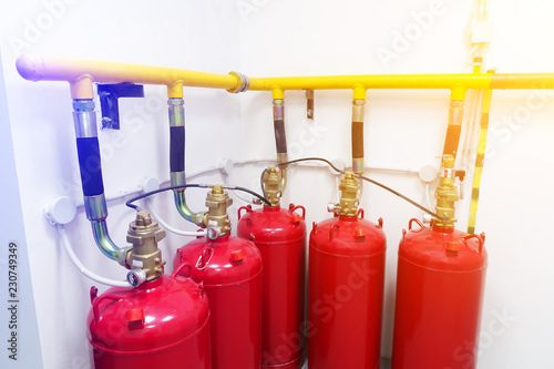 Cylinders and pipe fittings of industrial extinguishing system.