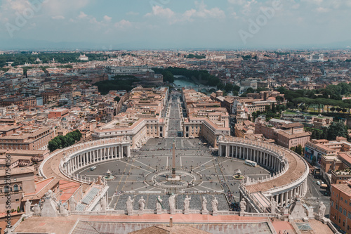 Saint Peters Square in the Vatican and an aerial view of the rooftops of Rome, Italy in a travel and tourism concept