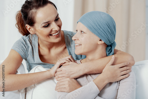 Woman showing support to her sister with cancer