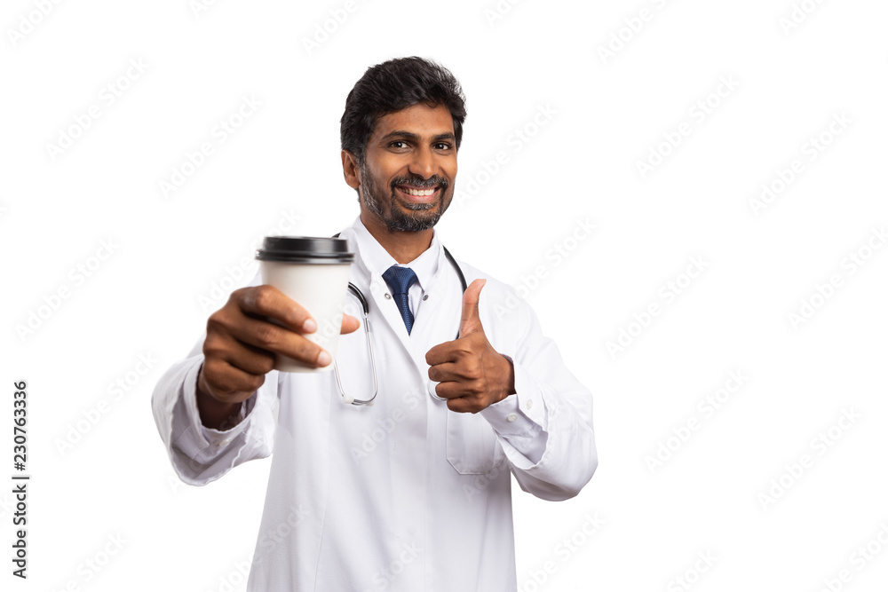Medic with thumb up holding coffee to-go cup. Medic with thumb up holding coffee to-go cup.