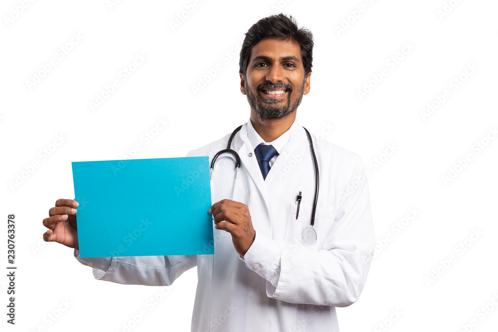 Doctor showing copyspace on blue paper. Doctor showing copyspace on blue paper.