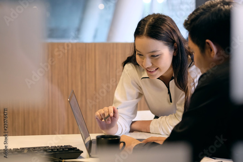 apprentice Intern teenage woman study business finance with senior staff.
