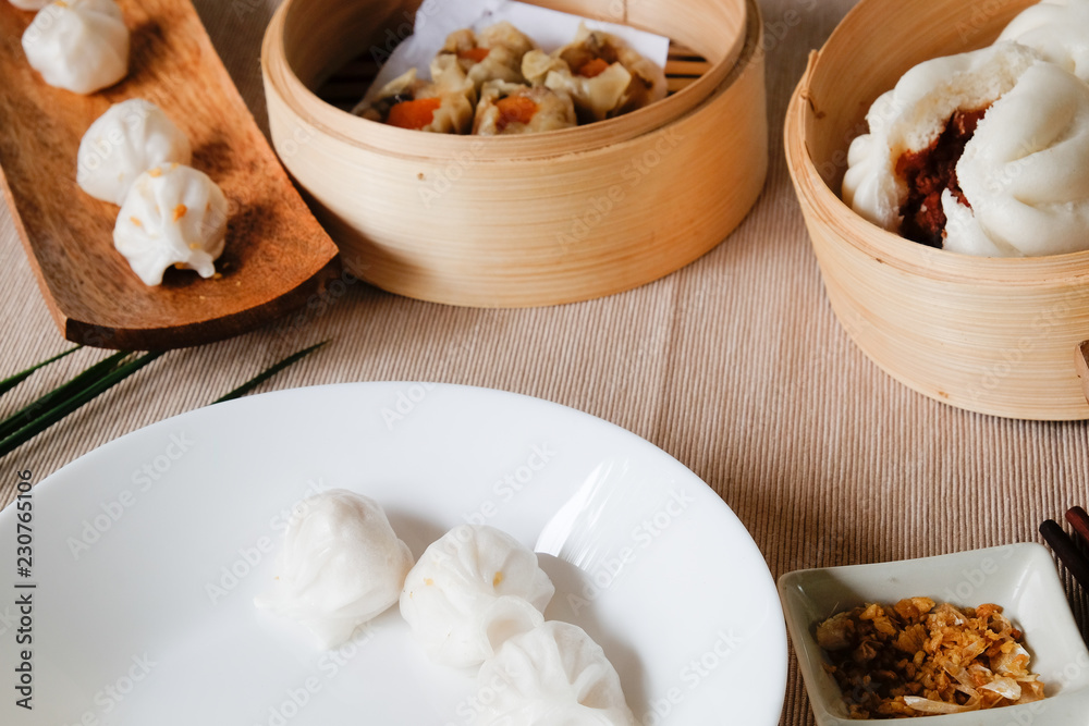 Set of Dim sum Enjoying traditional Chinese dumpling. Set of Dim sum Enjoying traditional Chinese dumpling.