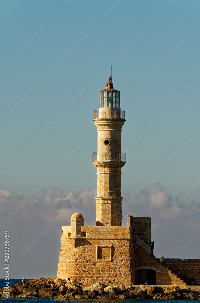 Lighthouse and cloudy sky. This lighthouse is located in Chania city, Crete