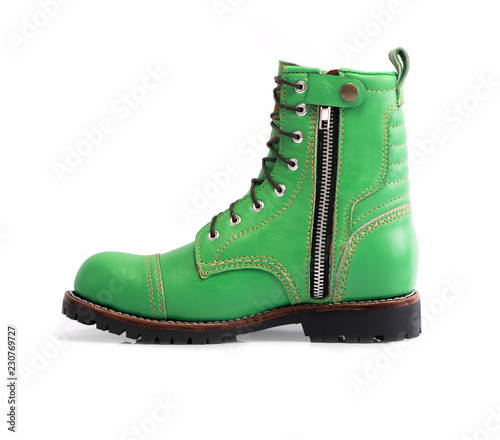 Men’s green boot with zipper isolated on white background.