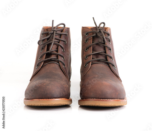 Brown oil full grain men’s ankle boot with steel toe for biker isolated on white background. Fashion advertising photos. © StepPro
