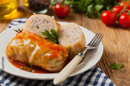 Traditional stuffed cabbage with minced meat and rice, served in a tomato sauce.