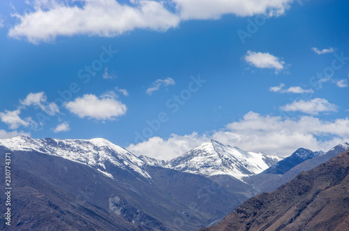 Desert and mountain over blue sky and white clouds on altiplano