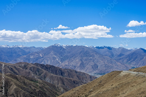 Desert and mountain over blue sky and white clouds on altiplano