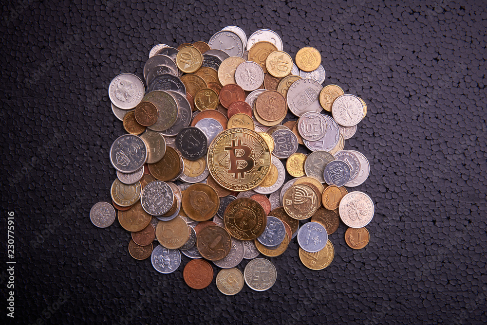 golden coin bitcoin and other coins on black background golden coin bitcoin and other coins on black background
