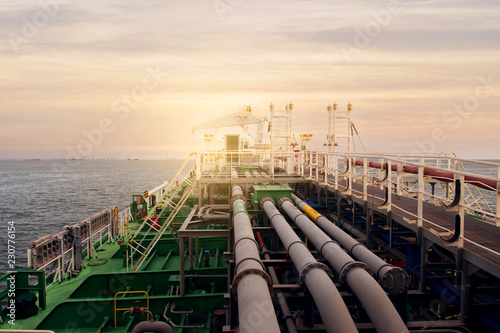 On deck of Chemical tanker ship with pipe lines connection while the ship is at sea.
