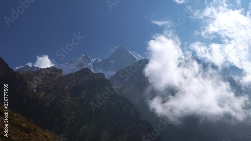 Annapurna region mountain timelapse. Timelapse of clouds around a mountain. Nepal. photo