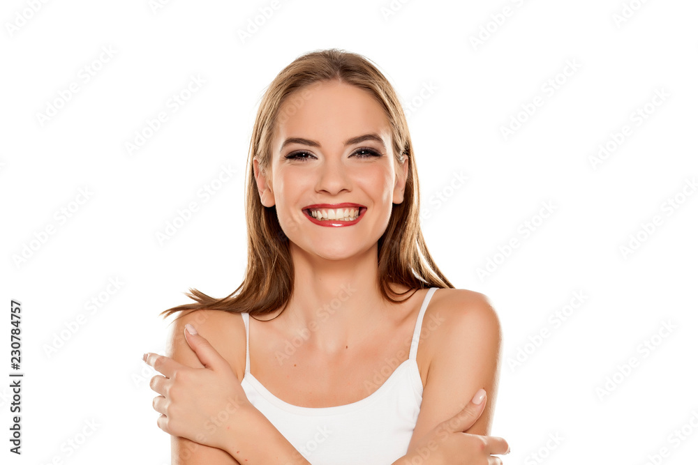 Portrait of young and happy beautiful woman with makeup on white backgeound Portrait of young and happy beautiful woman with makeup on white backgeound