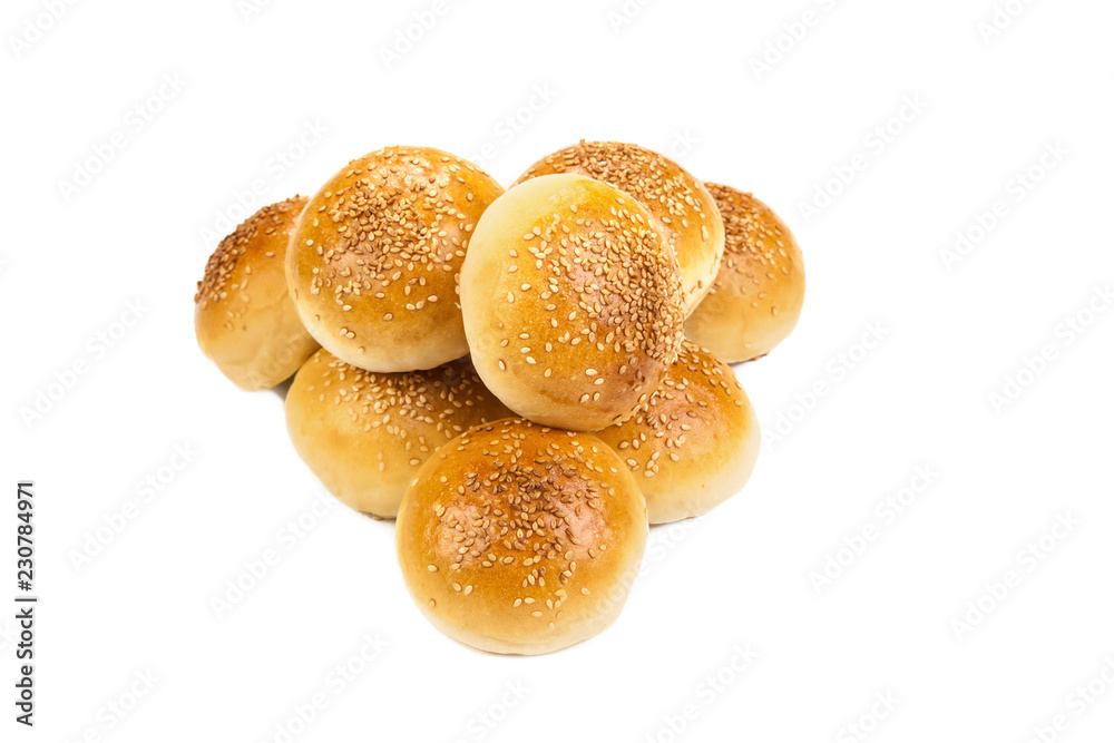 Round buns with sesame seeds isolated on white background Round buns with sesame seeds isolated on white background